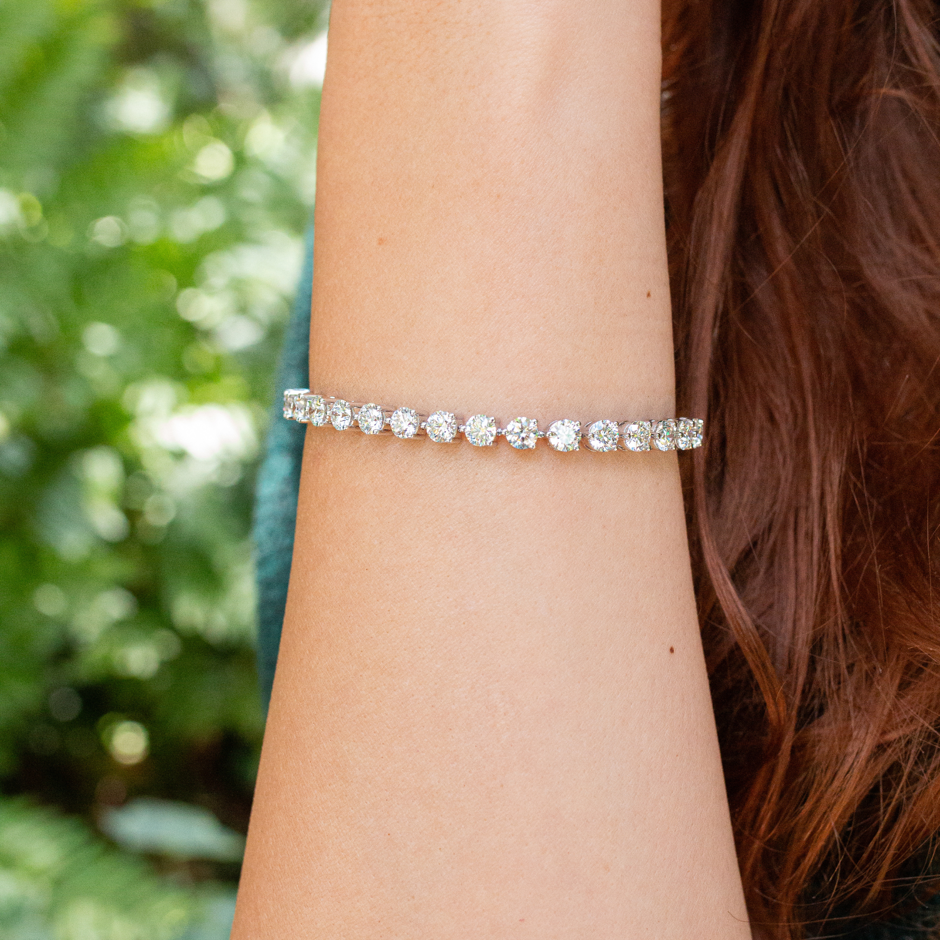 woman wearing tennis bracelet