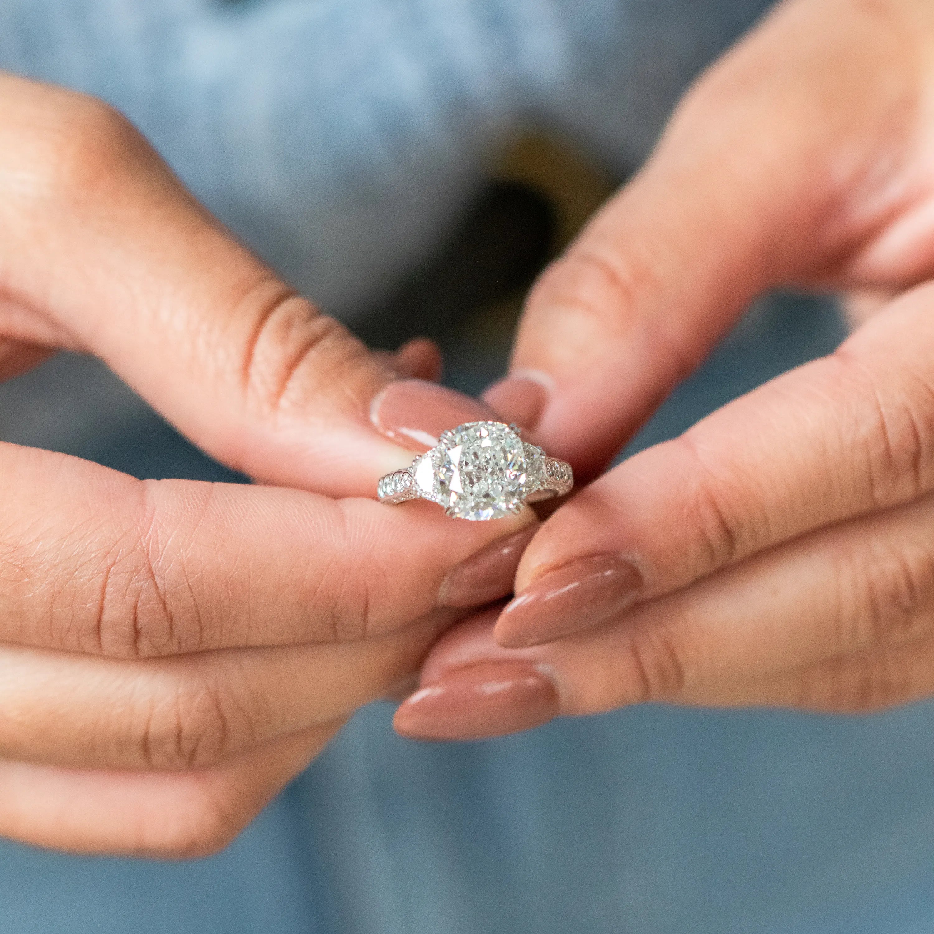 Woman Holding Engagement Ring