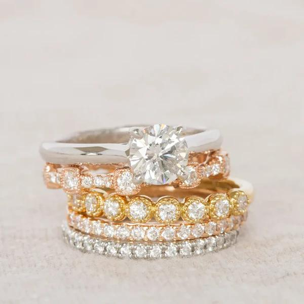 White gold engagment ring and yellow diamond bands