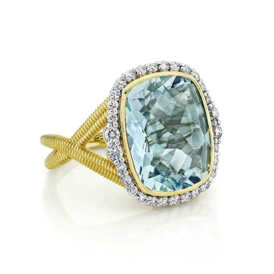 9.73ct Sky Blue Topaz and 0.42ct Diamond Halo Ring in 18K Yellow Gold, size 6.5