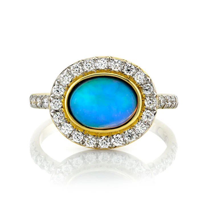 1.16ct Oval Ethiopian Opal and 0.48ct Diamond Halo Ring in 18K Yellow Gold, size 6.5