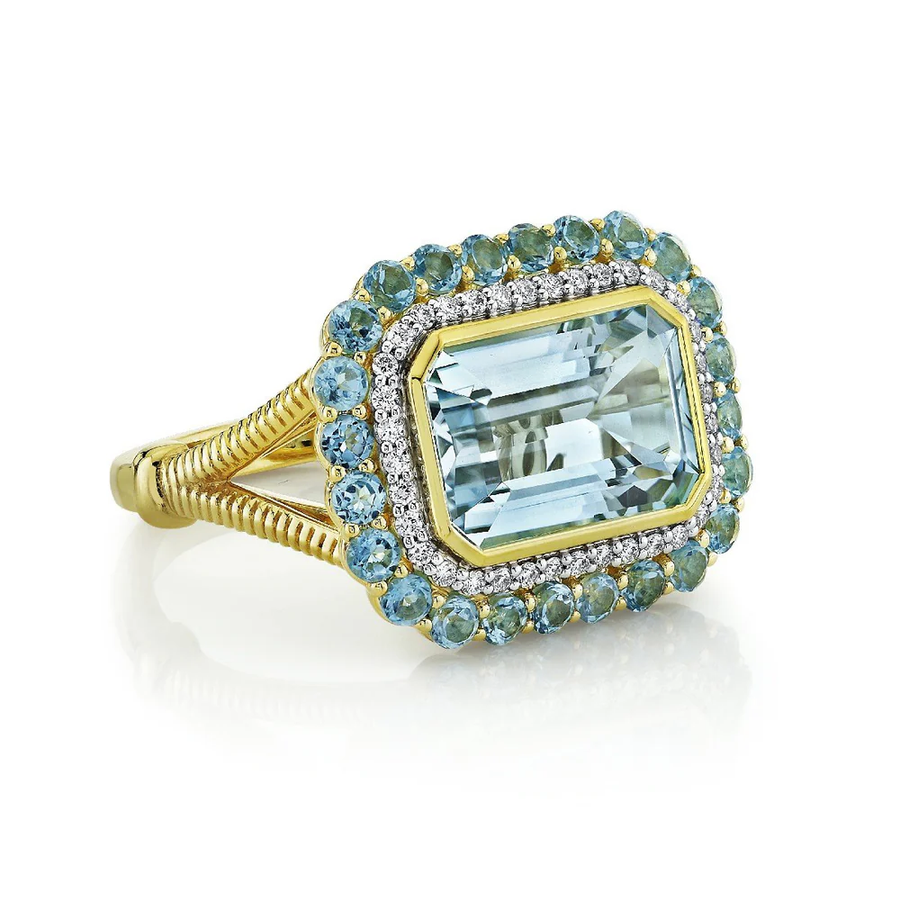 4.89ct Emerald Cut Sky Blue Topaz, 1.16ct Swiss Blue Topaz and 0.18ct Diamond Double Halo Ring in 18K Yellow Gold, size 6.5