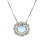 Platinum Sku Blue Topaz and Diamond Halo Pendant